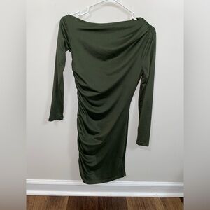 Off one shoulder, Tight solid green dress
Scrunched all the way up one side